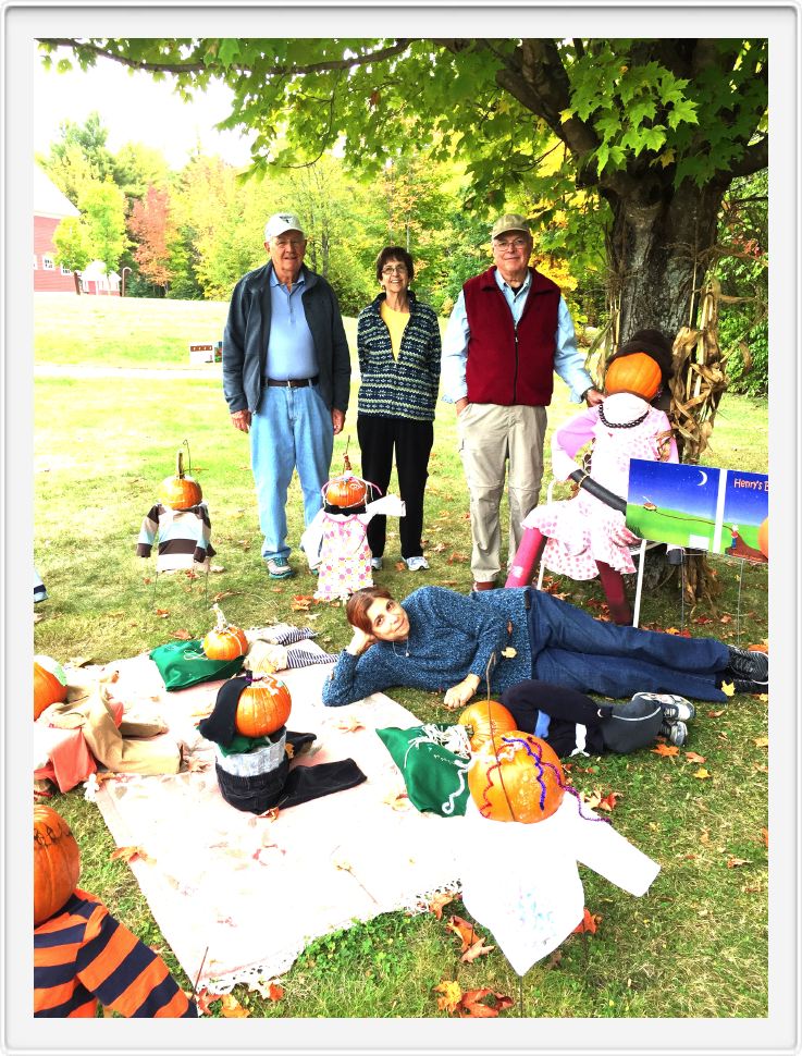 Judy Bell realxing with the Pumpkin People 